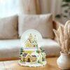 1760600449_71fCy5akL1L._AC_SX425_-1.jpg Resin Base Holiday Village Snow Globe Figurine