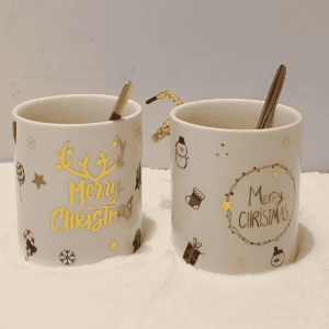 Joyful Christmas mugs with  festive designs.