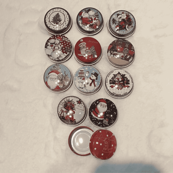 1760611111_Web_image_23-1.png Decorative Christmas themed tins.