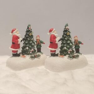 1760956608_WhatsApp_Image_2025-10-04_at_6.52.29_PM_1-1.jpeg Santa and Child Christmas Figurines Set