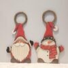 1760957071_WhatsApp_Image_2025-10-04_at_6.44.36_PM-1.jpeg Vintage Wooden Santa and Snowman Hangings