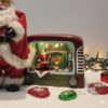 1760960511_unnamed_5-1.jpg Retro Radio Santa Figurine – Whimsical Holiday Scene
