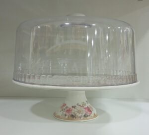 1780984666_WhatsApp_Image_2026-06-06_at_17.17.49-1.jpeg ceramic cake pedestal with acrylic dome cover