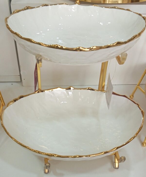 1781214331_WhatsApp_Image_2026-06-09_at_12.29.12-1.jpeg Two-Tier White Ceramic Oval Serving Bowls with Gold Stand