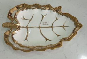1781247878_WhatsApp_Image_2026-06-09_at_13.20.58-1.jpeg Leaf-Shaped White Ceramic Serving Dish with Gold Vein Detailing