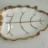1781247881_WhatsApp_Image_2026-06-09_at_13.21.25-1.jpeg Leaf-Shaped White Ceramic Serving Dish with Gold Vein Detailing