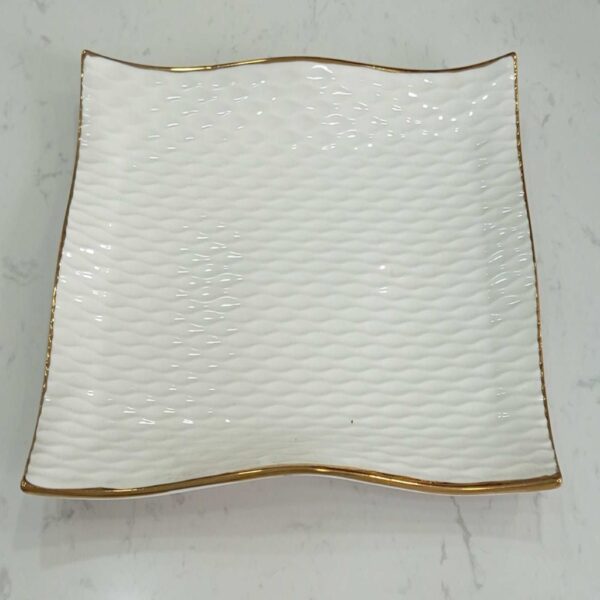 1781616253_WhatsApp_Image_2026-06-09_at_13.19.11-1.jpg Textured Rectangular Ceramic Serving Dish with Gold Rim