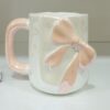 1781946783_WhatsApp_Image_2026-06-18_at_10.07.36-1.jpeg Elegant Pastel Bow Ceramic Mug