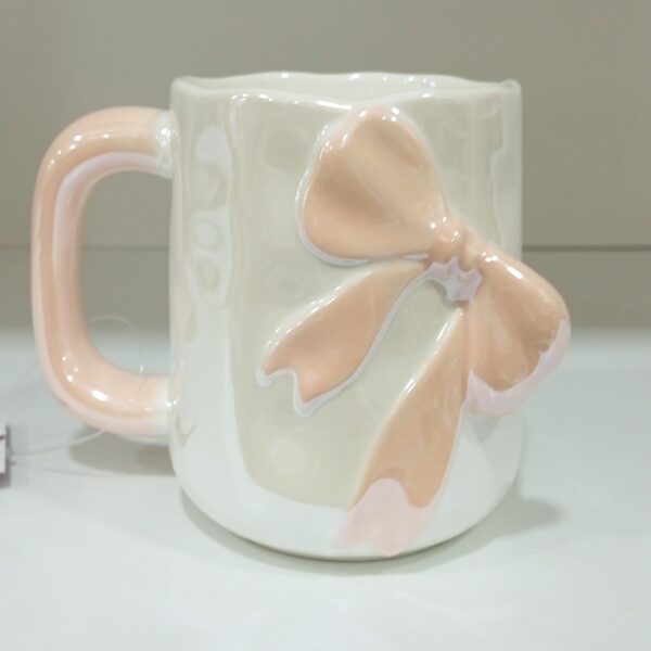 1781946783_WhatsApp_Image_2026-06-18_at_10.07.36-1.jpeg Elegant Pastel Bow Ceramic Mug
