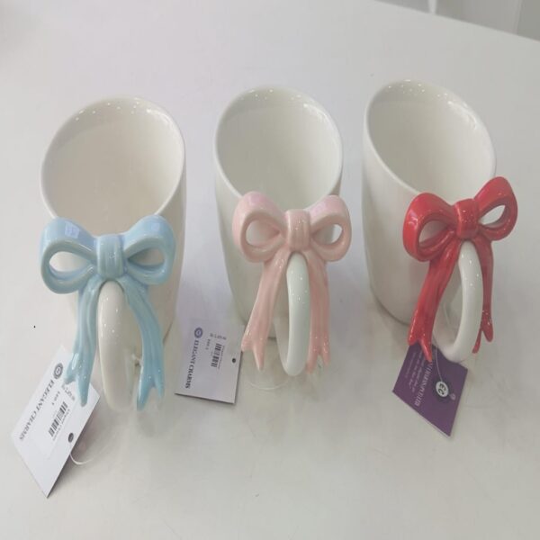 1781947348_WhatsApp_Image_2026-06-18_at_10.08.16-1.jpeg Charming Bow Accent Ceramic Mug