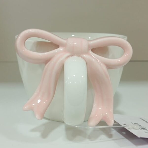 1781947350_WhatsApp_Image_2026-06-18_at_10.07.59_1-1.jpeg Charming Bow Accent Ceramic Mug