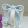1781947353_WhatsApp_Image_2026-06-18_at_10.08.00-1.jpeg Charming Bow Accent Ceramic Mug