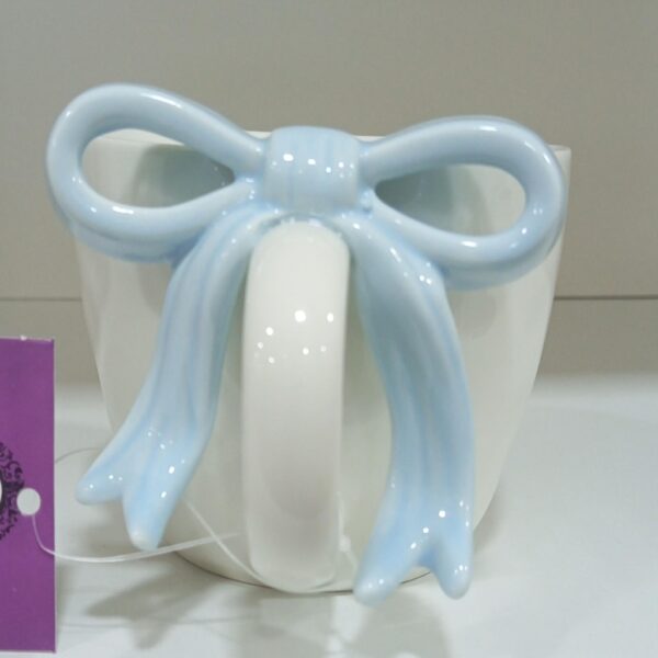 1781947353_WhatsApp_Image_2026-06-18_at_10.08.00-1.jpeg Charming Bow Accent Ceramic Mug