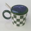 1781948370_WhatsApp_Image_2026-06-18_at_10.14.33-1.jpeg Checkerboard Ceramic Mug with Lid & Spoon