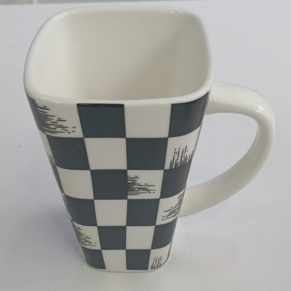 1782117565_WhatsApp_Image_2026-06-18_at_10.10.13-1-1.jpeg Modern Black And White Checkered Ceramic Mug
