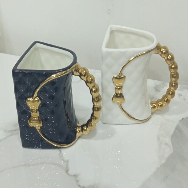 1782126413_WhatsApp_Image_2026-06-22_at_16.34.04-1.jpeg Bow Accent Luxury Ceramic Mug