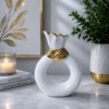 1786530620_ChatGPT_Image_Aug_12_2026_03_18_19_PM-1.png Luxury White And Gold Ring-Shaped Decorative Vase
