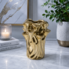 1786531232_ChatGPT_Image_Aug_12_2026_04_07_31_PM-1.png Luxury Gold Sculptural Decorative Vase
