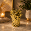 1786531237_ChatGPT_Image_Aug_9_2026_07_00_36_PM-1.png Luxury Gold Sculptural Decorative Vase