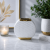 1786531258_ChatGPT_Image_Aug_12_2026_03_17_53_PM-1.png Elegant White And Gold Textured Decorative Vase