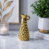 1786531300_ChatGPT_Image_Aug_12_2026_03_17_59_PM-1.png Luxury Gold Textured Decorative Pitcher