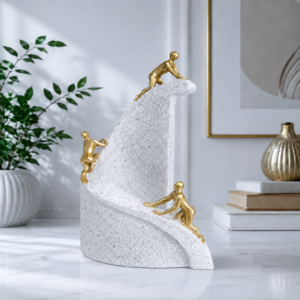 1786611163_ChatGPT_Image_Aug_13_2026_02_06_27_PM-1.png Luxury Gold Human Climbing Sculpture