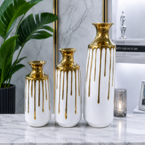 1786611725_ChatGPT_Image_Aug_13_2026_02_01_48_PM_1-1.png Luxury Gold And White Decorative Vase Set